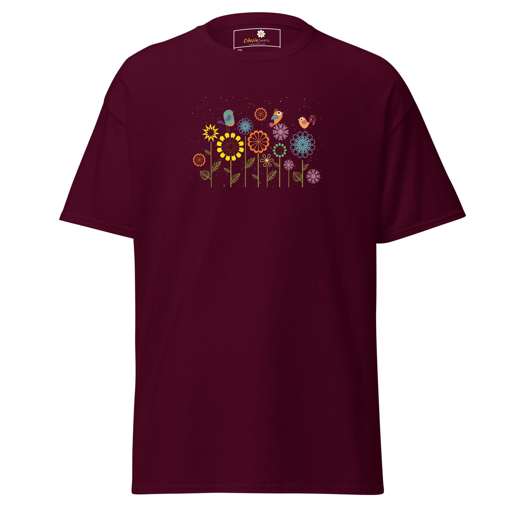 Maroon t-shirt with floral and bird design.